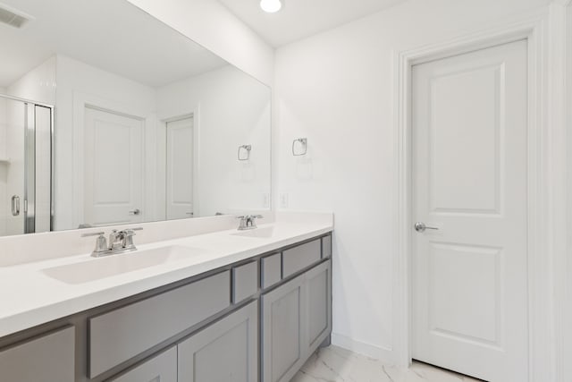 1814 Cypress Gap Trl, Mansfield, TX 76063 - bathroom with double vanity, marble finish floors, a shower stall, and recessed lighting