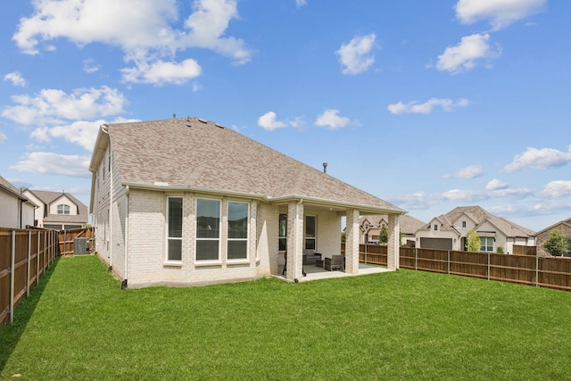 1814 Cypress Gap Trl, Mansfield, TX 76063 - back of house with a fenced backyard, a patio, brick siding, and a shingled roof