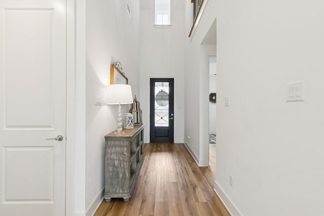 1814 Cypress Gap Trl, Mansfield, TX 76063 - entryway featuring wood finished floors and a towering ceiling