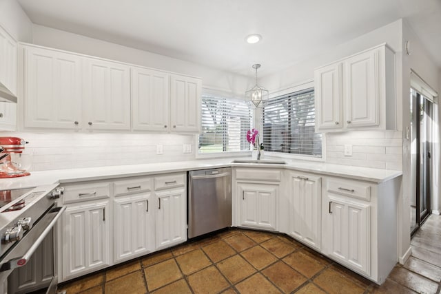 6250 Twin Oaks Cir, Dallas, TX 75240 - kitchen with appliances with stainless steel finishes, tasteful backsplash, white cabinetry, and recessed lighting