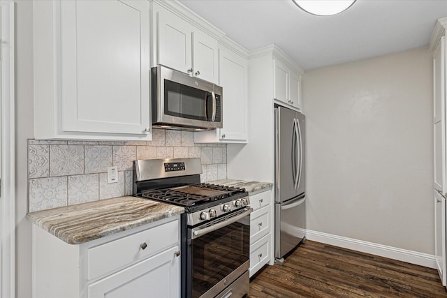 4632 Ivanhoe Dr, Fort Worth, TX 76132 - kitchen featuring stainless steel appliances, backsplash, dark wood finished floors, white cabinetry, and light stone counters