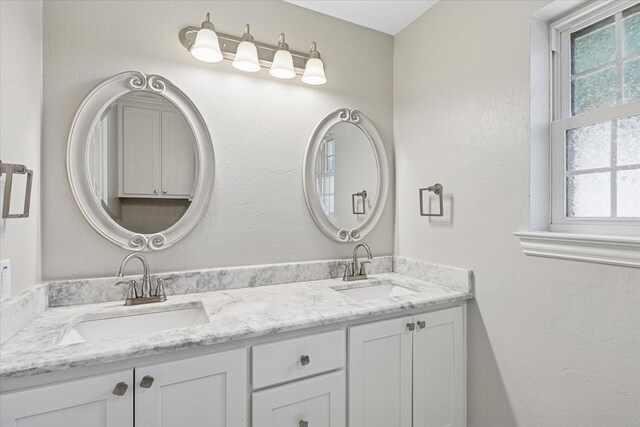 4632 Ivanhoe Dr, Fort Worth, TX 76132 - bathroom with healthy amount of natural light and double vanity