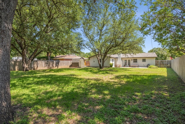 4632 Ivanhoe Dr, Fort Worth, TX 76132 - fenced backyard with a shed and french doors