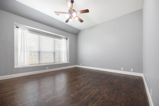 1020 Perennial Ln, Little Elm, TX 75068 - empty room with dark wood-style floors, a ceiling fan, and vaulted ceiling