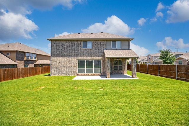 1020 Perennial Ln, Little Elm, TX 75068 - rear view of house with a patio area, a fenced backyard, brick siding, and roof with shingles