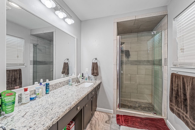 1007 College Ave, Glen Rose, TX 76043 - full bathroom featuring vanity and a shower stall