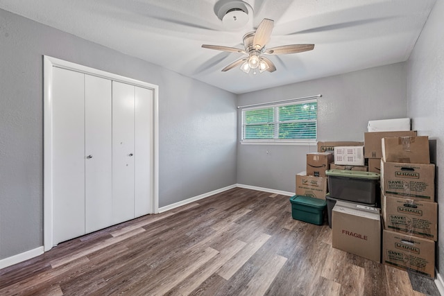 1007 College Ave, Glen Rose, TX 76043 - bedroom with wood finished floors, a closet, and a ceiling fan
