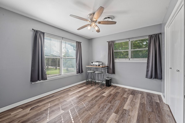 1007 College Ave, Glen Rose, TX 76043 - unfurnished room featuring wood finished floors and ceiling fan