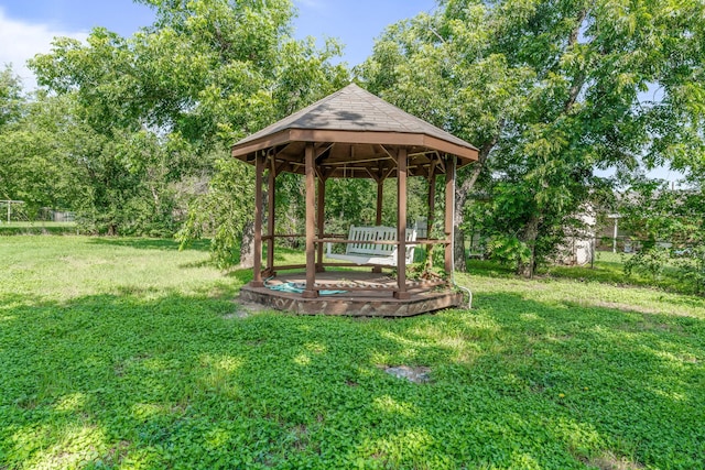 1007 College Ave, Glen Rose, TX 76043 - view of green lawn with a gazebo and view of wooded area