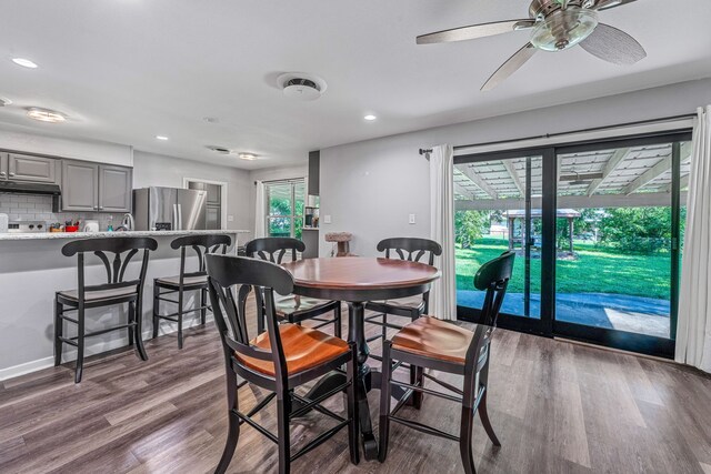 1007 College Ave, Glen Rose, TX 76043 - dining room with wood finished floors, ceiling fan, and recessed lighting