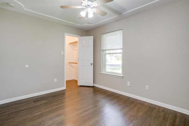 555 Meadowbrook Dr, Burleson, TX 76028 - empty room with dark wood-style floors, ceiling fan, and a smoke detector