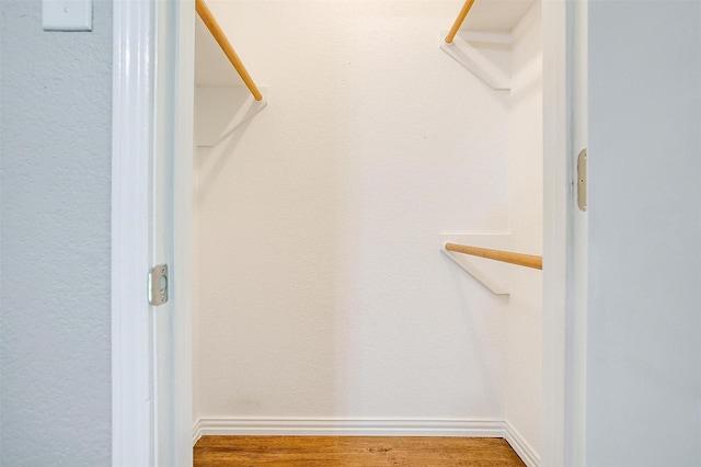 555 Meadowbrook Dr, Burleson, TX 76028 - walk in closet featuring wood finished floors