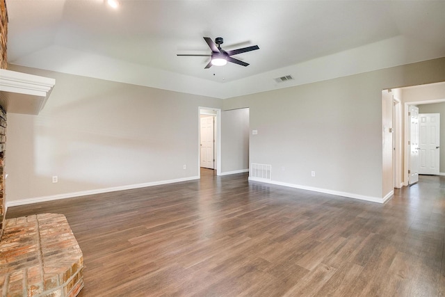 555 Meadowbrook Dr, Burleson, TX 76028 - unfurnished living room with ceiling fan, dark wood-style floors, and a brick fireplace