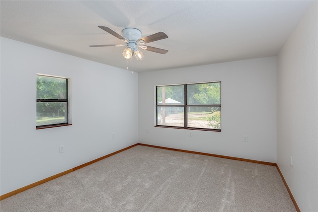 4525 Midway Rd, Weatherford, TX 76085 - spare room with carpet and ceiling fan