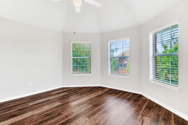 2400 Havard Oak Dr, Plano, TX 75074 - empty room featuring dark wood-style flooring, lofted ceiling, and ceiling fan