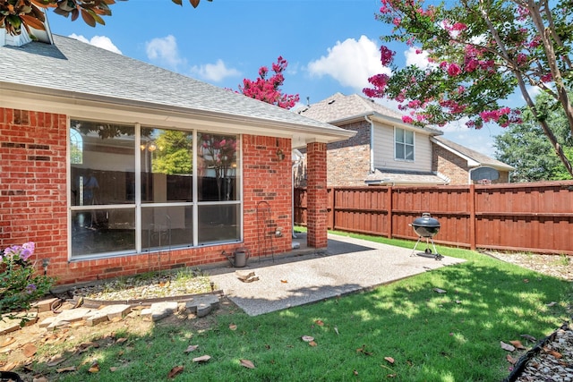 2400 Havard Oak Dr, Plano, TX 75074 - back of house with brick siding, a patio area, and a shingled roof