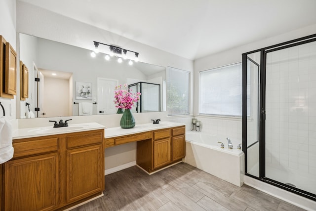 3341 Woodglen Dr, Mckinney, TX 75071 - full bath with a stall shower, a garden tub, double vanity, and wood finished floors