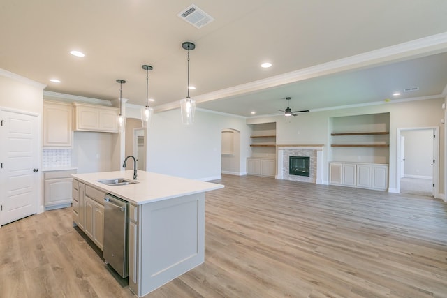 213 Navajo Trl, Alvarado, TX 76009 - kitchen with ceiling fan, crown molding, dishwasher, light countertops, and recessed lighting