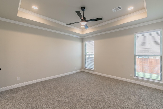 213 Navajo Trl, Alvarado, TX 76009 - carpeted spare room with a tray ceiling, a ceiling fan, crown molding, and recessed lighting