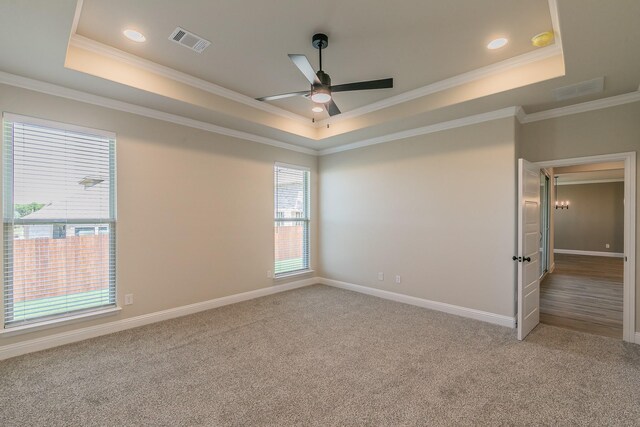 213 Navajo Trl, Alvarado, TX 76009 - carpeted empty room featuring a raised ceiling, ceiling fan, ornamental molding, a smoke detector, and recessed lighting