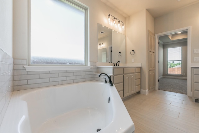 213 Navajo Trl, Alvarado, TX 76009 - bathroom featuring vanity and a garden tub