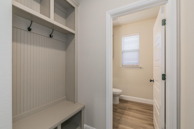 213 Navajo Trl, Alvarado, TX 76009 - mudroom featuring baseboards and light wood-type flooring