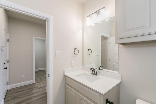 213 Navajo Trl, Alvarado, TX 76009 - bathroom featuring wood finished floors and vanity