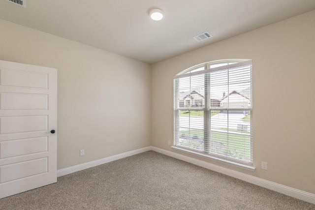 213 Navajo Trl, Alvarado, TX 76009 - empty room featuring carpet flooring and baseboards