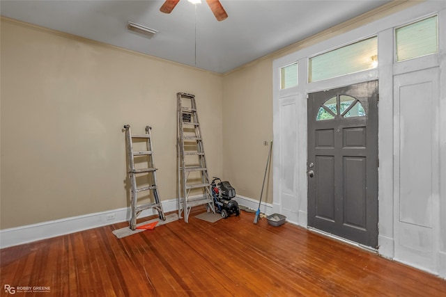 538 Dalzell St, Shreveport, LA 71104 - foyer featuring a ceiling fan, crown molding, and wood finished floors
