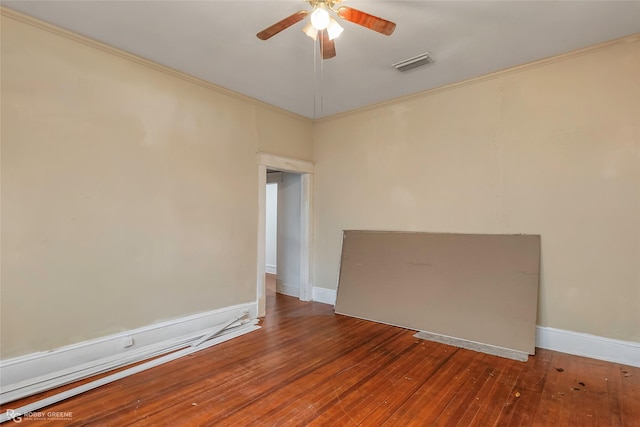 538 Dalzell St, Shreveport, LA 71104 - empty room featuring a ceiling fan, wood-type flooring, and crown molding