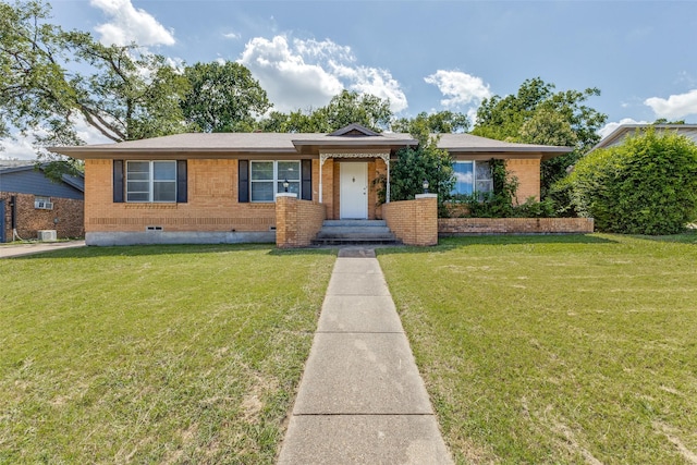 3209 Pecan Ln, Garland, TX 75041 - view of front of property with brick siding, a front lawn, and crawl space