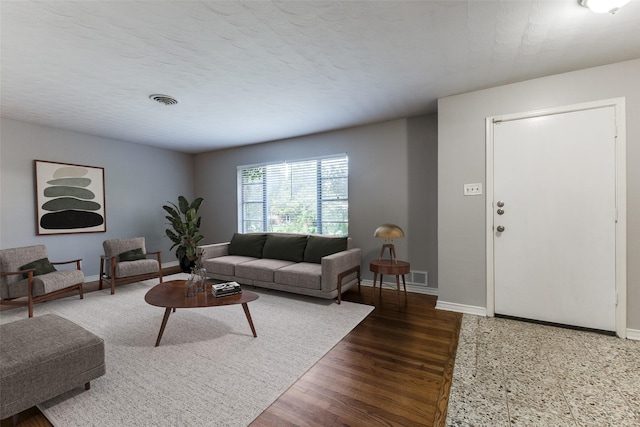 3209 Pecan Ln, Garland, TX 75041 - living room with baseboards and wood finished floors