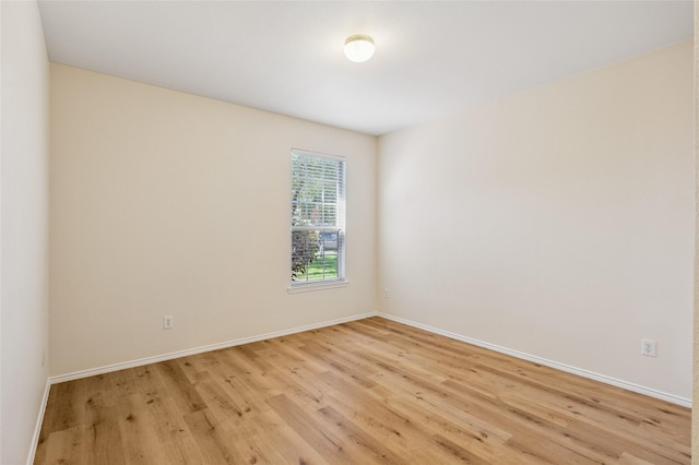 2409 Spruce Ct, Little Elm, TX 75068 - spare room featuring light wood finished floors