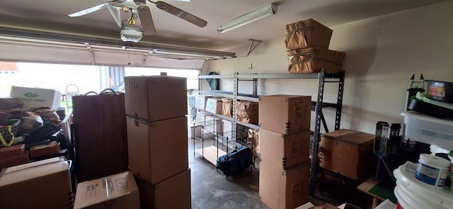 5782 Bayou Dr, Bossier City, LA 71112 - garage with ceiling fan and freestanding refrigerator
