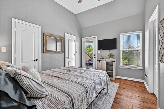 107 Bob Jones Ct, Pottsboro, TX 75076 - bedroom with vaulted ceiling, access to exterior, wood finished floors, and ceiling fan