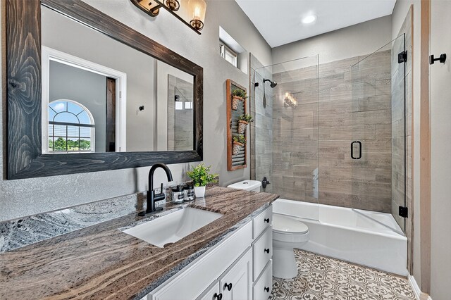 107 Bob Jones Ct, Pottsboro, TX 75076 - bathroom featuring vanity, shower / bath combination with glass door, tile patterned floors, and healthy amount of natural light