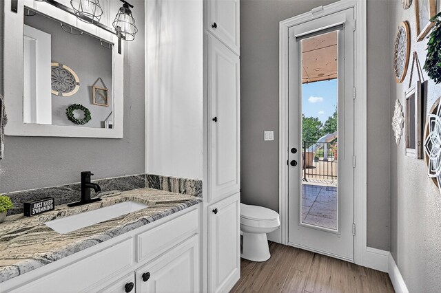 107 Bob Jones Ct, Pottsboro, TX 75076 - bathroom with vanity and wood finished floors