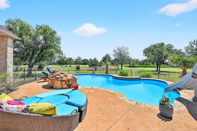 107 Bob Jones Ct, Pottsboro, TX 75076 - view of swimming pool with a water slide, a fenced backyard, and a patio