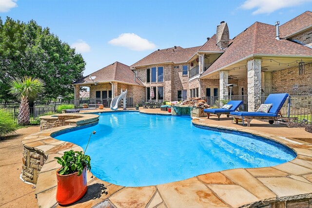 107 Bob Jones Ct, Pottsboro, TX 75076 - view of pool featuring a water slide and a patio area