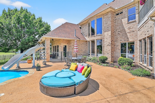 107 Bob Jones Ct, Pottsboro, TX 75076 - back of house with a patio area, brick siding, and a shingled roof