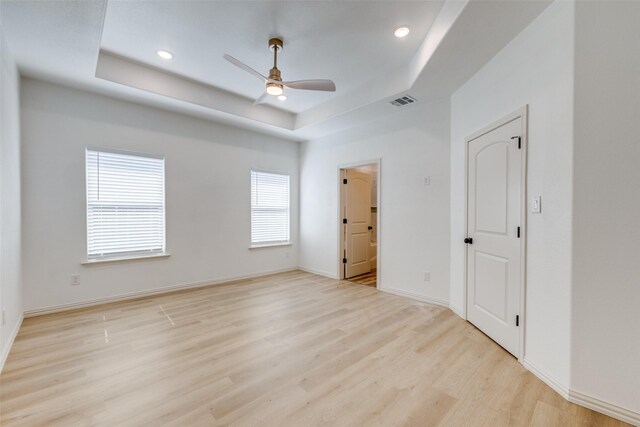 1328 Glasgow Rd, Fort Worth, TX 76134 - unfurnished bedroom with a raised ceiling, wood finished floors, recessed lighting, and ceiling fan