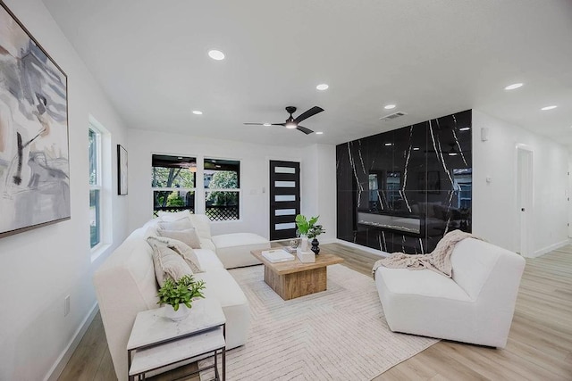 2504 Guilford Rd, Fort Worth, TX 76107 - living area with wood finished floors, recessed lighting, and a ceiling fan