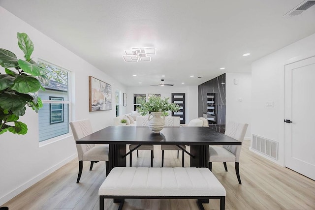 2504 Guilford Rd, Fort Worth, TX 76107 - dining area featuring light wood-style flooring, a ceiling fan, and recessed lighting