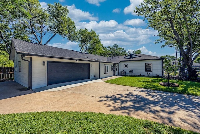 2504 Guilford Rd, Fort Worth, TX 76107 - ranch-style house with a garage, driveway, and a shingled roof