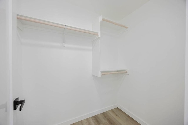 2504 Guilford Rd, Fort Worth, TX 76107 - spacious closet featuring light wood-style floors