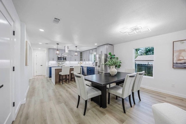 2504 Guilford Rd, Fort Worth, TX 76107 - dining space with light wood-type flooring and recessed lighting