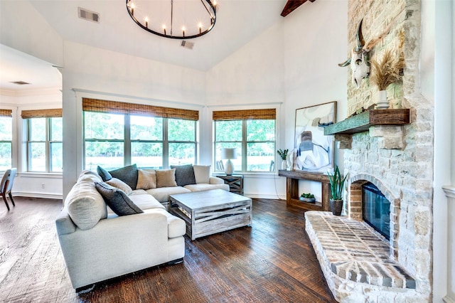 800 Manor Dr, Argyle, TX 76226 - living area with healthy amount of natural light, a chandelier, wood finished floors, and high vaulted ceiling