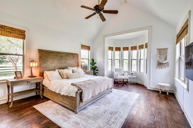 800 Manor Dr, Argyle, TX 76226 - bedroom featuring multiple windows, dark wood finished floors, beamed ceiling, and high vaulted ceiling