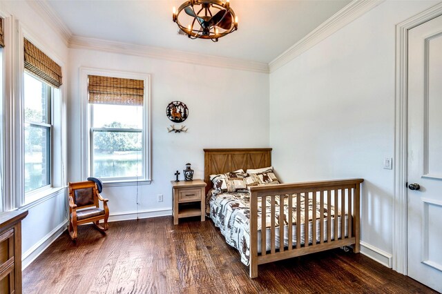 800 Manor Dr, Argyle, TX 76226 - bedroom with wood finished floors, multiple windows, crown molding, and a chandelier