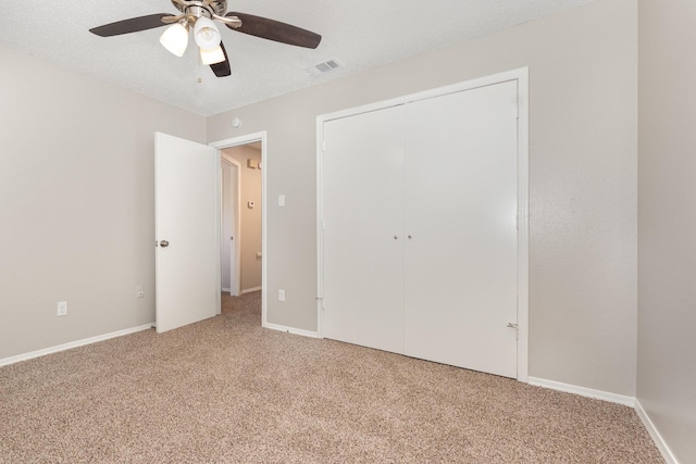 828 Whitehall Dr, Plano, TX 75023 - unfurnished bedroom featuring light colored carpet, a closet, and a ceiling fan